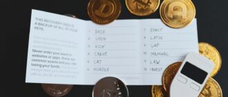 a cell phone sitting on top of a pile of coins