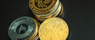 a pile of gold and silver coins sitting on top of each other