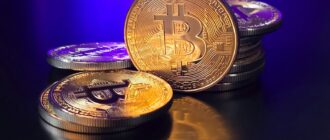 a pile of bitcoins sitting on top of a table