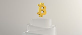 a gold crown on a stack of white paper