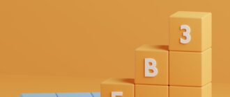 a block tower with the letters b e w on it