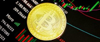 gold round coin on black surface