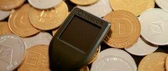 a cell phone sitting on top of a pile of coins