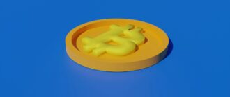 a yellow plastic object sitting on top of a blue surface